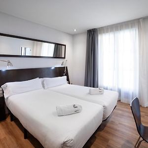 Kamer met een Queen Size Bed